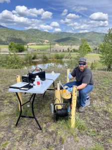 Water sampling being conducted at a groundwater well.
