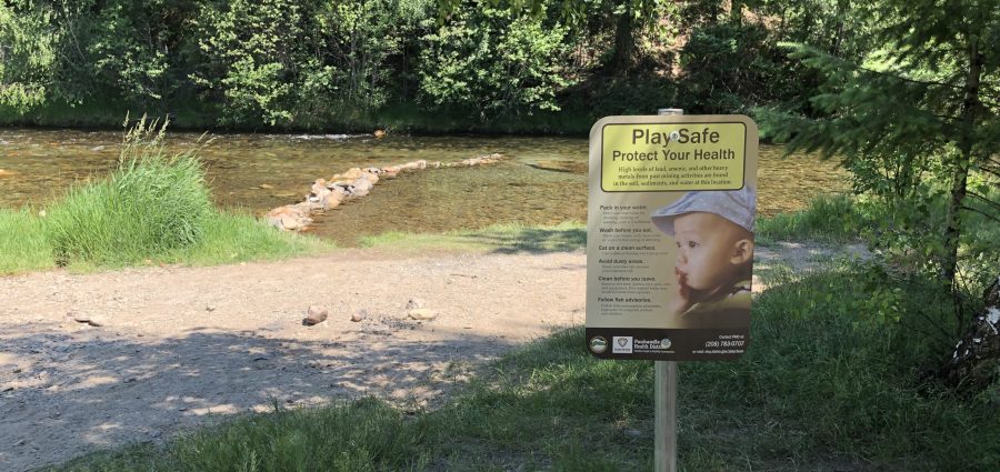 LHIP Warning Sign near Contaminated Creek